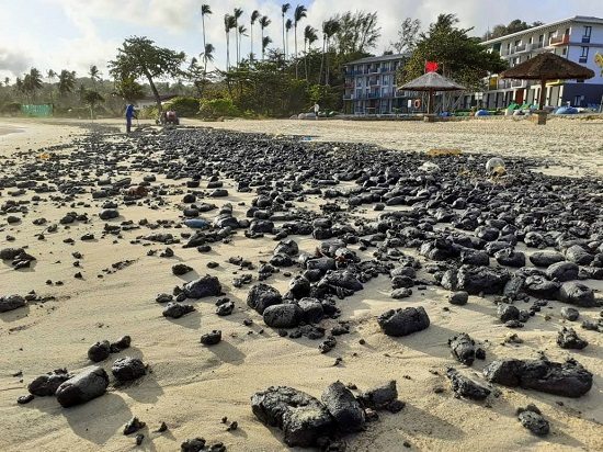 Solid oil spills in front of a Bintan Island resort